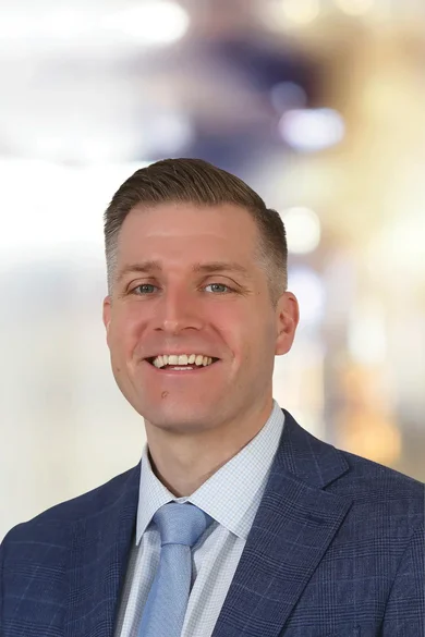 Portrait of Aidan Jones, REALTOR®.